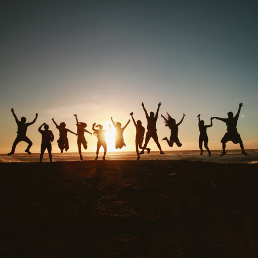 People jumping at the beach